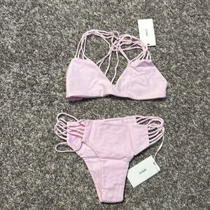 New with tags Mikoh bikini. Size large. Runs really small.